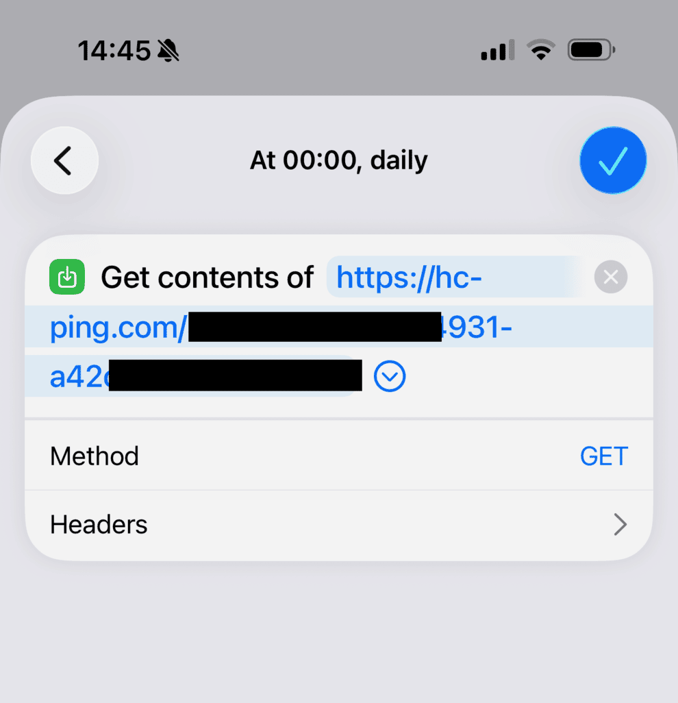 Shortcut that pings healthchecks.io every day at midnight.